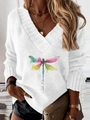 Detail of V-neck white knit sweater with colorful dragonfly print and let it be text - S / White