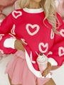 Detail of red knit heart sweater with white ribbed neck, cuffs and heart patterns - S / Red