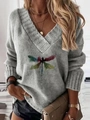 Detail of grey V-neck knit sweater featuring a colorful dragonfly print on the chest - S / Gray