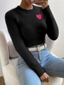 Detail of soft mohair texture and bright pink heart patch on black women sweater - S / Black