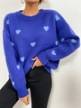 Detail van de gebreide textuur van de koningsblauwe trui met lichtblauwe hart jacquard - S / Blauw