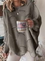Dettaglio di un maglione grigio in maglia traforata con trama a onde e maniche a pipistrello - S / Grigio