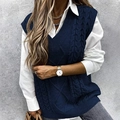 Women's dark blue V-neck cable knit sweater vest styled over a white shirt for casual look - S / Navy Blue