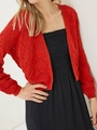 Women's red hollow-out knit cardigan with long sleeves and cropped cut over a black dress - S / Red