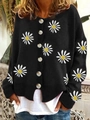 Detail of white daisy floral embroidery on black knitted cardigan with large round buttons - Black
