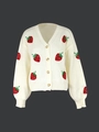 Detailed view of knitted cardigan with strawberry embroidery and amber-textured buttons - Off White