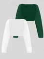 Close-up of knit cropped shrug bolero showing forest green and white textures and stitching - Green + White
