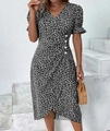 Detail of V-neck floral midi dress with white button accents and ruffled short sleeves - Black