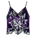 Detailed close-up of purple sequin halter top featuring shiny silver floral pattern - One Size / Purple
