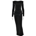 Elegante zwarte bodycon maxi-jurk met lange mouwen, schoudervullingen en gedrapeerde taille - S / Zwart