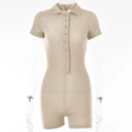 Tutina oro champagne scintillante con colletto polo, bottoni e maniche corte - S / Cachi