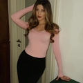 Detail of light pink V-neck long sleeve top featuring delicate lace trim and knit fabric - S / Pink