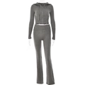 Detail of grey knitted two-piece set showing ribbed waistband and smooth zipper texture - S / Top And Bottom / Gray