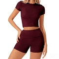 Détail du tissu en maille extensible bordeaux sur cet ensemble de sport femme - S / Bordeaux