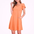 Détail de la robe orange avec manches pétales et poches latérales invisibles - S / Corail