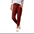 Detalle de pantalones deportivos burdeos con cintura elástica y grandes bolsillos - S / Burdeos