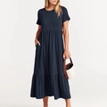 Detail of navy blue tiered maxi dress with side pockets and a layered pleated skirt design - S / Dark Blue