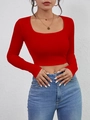 Detail view of the ribbed fabric texture on this slim red square neck crop top - Red