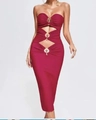 Close-up of wine red bandage dress featuring hollow cut-outs and metallic rings - XS / Burgundy