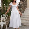 Elegant white square neck dress with puff sleeves and lace detail in outdoor garden setting - XS / White