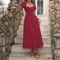 Elegant wine red milkmaid dress with puff sleeves and lace neckline on a scenic stone backdrop - XS / Red