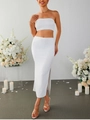Dettaglio di un completo bianco a due pezzi in pizzo con top a fascia e gonna a spacco - XS / Bianco