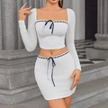 Chic white knit two-piece set with square neck crop top and bodycon skirt featuring lace bows - XS / White