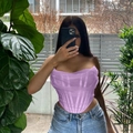 Detail of purple mesh corset top featuring boning structure and ruched bust design - S / Purple