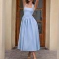 Elegant light blue halter midi dress with pleated skirt and open back design - XS / Blue