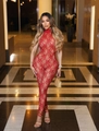 Elegante tuta rossa in pizzo con allacciatura al collo, motivi floreali e vestibilità slim - S / Rosso