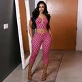 Ensemble rose et noir à pois avec haut dos nu et pantalon ajusté à taille haute élégant - Rose rouge