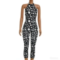 Detaillierte Ansicht von Halterneck und Polka-Dot-Muster am schmalen Jumpsuit - S / Schwarz
