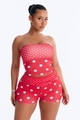 Detail of red polka dot two-piece set featuring tube top and slim-fit shorts for women - Red