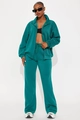 Women's teal lounge set featuring stand-up collar zip jacket and wide leg pants - Malachite green