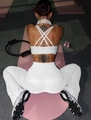 White yoga set with U-neck bra and flared leggings displayed with gym equipment - S / White Zirconia Set