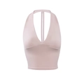 Primo piano del crop top yoga rosa con nodo a torsione sul davanti e tessuto a maglia elastica - S / Top (Canotta) / Rosa