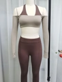 Three-piece yoga set showing sports bra, shrug top and leggings on a mannequin - S / Almond / Truffle Top