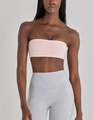 Detail of pink strapless sports bra with white contrast trim and high-waisted gray leggings - S / Tops / Pink (White Piping)