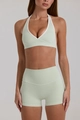 Dettagli del set yoga verde chiaro con bordi bianchi a contrasto e pantaloncini - Taglia S / Stile Reggiseno Verde Chiaro
