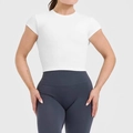 Detail of high-stretch white cropped sports tee and charcoal high-waist yoga leggings - White