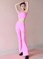 Pink one-shoulder yoga set with cutout detail top and flared leggings for women - Magenta