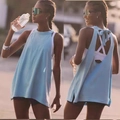 Detail of light blue yoga top featuring a stylish back cutout and ribbon tie design - S / Sky Blue