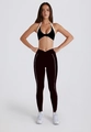 Detail view of two-piece yoga set with halter sports bra and high-waisted v-cut leggings - Black Halter Top