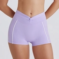 Detail of light purple yoga shorts featuring a criss-cross waist and white side stripes - Light Purple Shorts