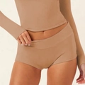 Detail of camel yoga set featuring long sleeve cropped top and high waist sports shorts - S / Khaki Shorts
