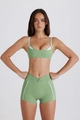 Grasgrünes zweiteiliges Yoga-Set mit Sport-BH und High-Waist-Shorts mit weißem Rand - Hellgrünes Oberteil / S