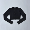 Détail du cardigan en maille côtelée noire avec col montant et fermeture éclair double - S / Haut (Manches Longues) / Noir