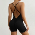 Dettaglio delle spalline incrociate e design arricciato sul body da yoga nero - S / Nero
