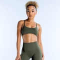 Detail of olive green seamless yoga set showing flexible fabric texture and fit - Olive Green