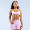 Pink halter neck sports bra and yoga shorts set on model in high-elastic matte fabric - Pink